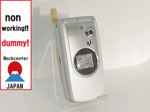 【Factice !】 TOSHIBA TSX06 iida X-RAY (couleur rouge) au-japon téléphone portable qui ne fonctionne pas - Photo 1 sur 3