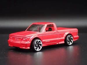 Camioneta GMC SYCLONE 1991 Roja Modelo A Escala 1:64 Diorama Diecast - Imagen 1 de 7