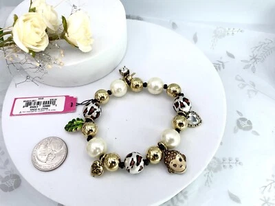Betsey Johnson Vintage Leopard Bead /Pearl Monkey Sign Charm Elastic Bracelet - Image 1 of 4