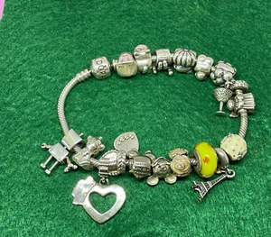 SOLID STERLING SILVER PANDORA BRACELET 17 CHARMS USED CONDITION 21CM 21CM - Picture 1 of 2