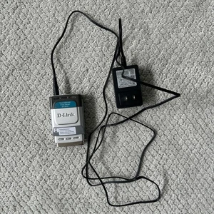 D-Link DP-301P+ Fast Ethernet Parallel Port Print Server - Afbeelding 1 van 4