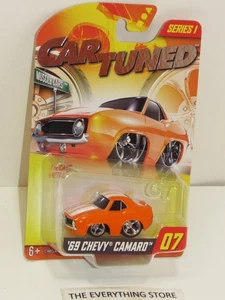 MGA ENTERTAINMENT CARTUNED 69 CHEVY CAMARO NARANJA BLANCO RAYAS #07 SERIE 1 - Imagen 1 de 2