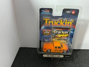 1/64 Muscle Machines Truckin Ford F-150 Truck Orange w/ Purple Flames B14 - Picture 1 of 1