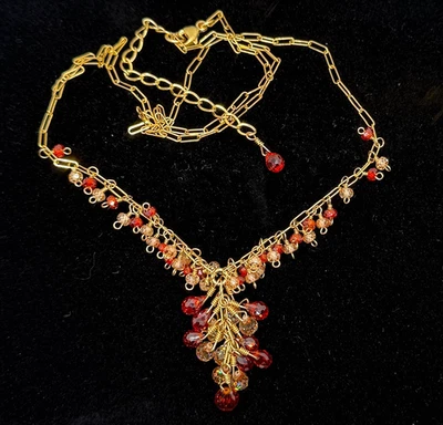 Collar relleno de oro 14k con cristales rojos y champán Foto 1 de 3