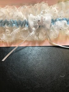 NEW WEDDING GARTER, FROM LOCAL WEDDING SHOP, NOW CLOSED. MANY LISTED.(GRY-99-54 - Picture 1 of 2