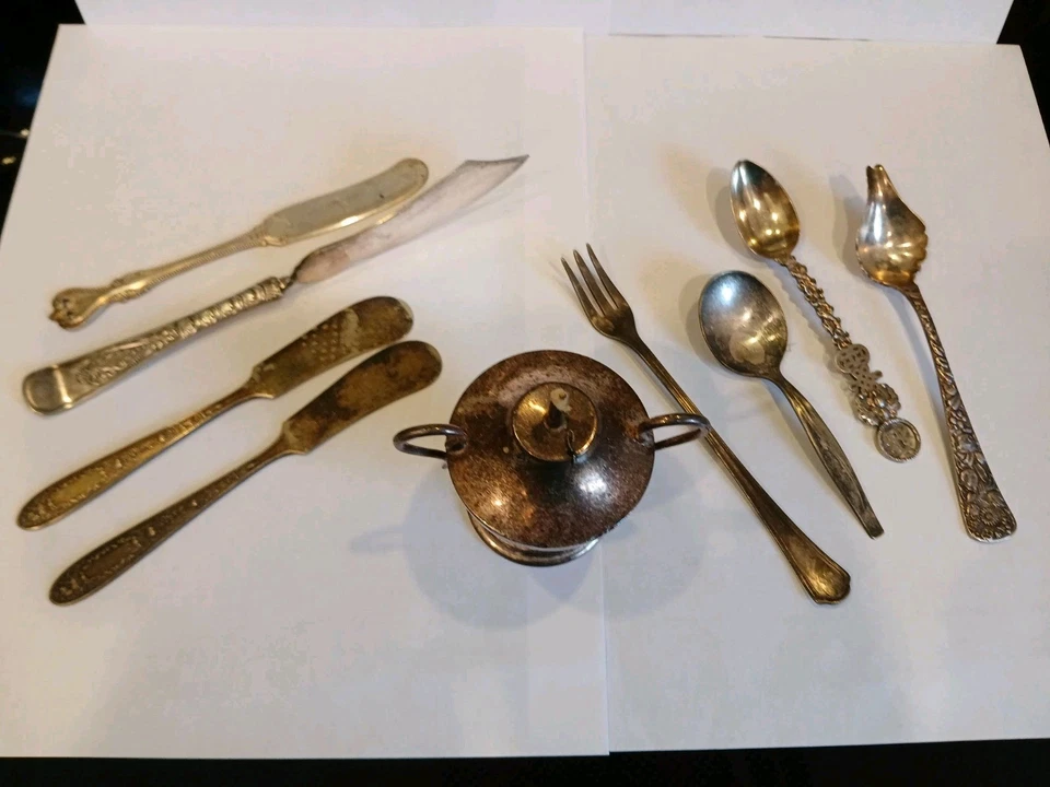 9 Items Silver Plate & Sterling Spoons, Fork, Knives, Mini Oil Lamp - Image 1 of 4