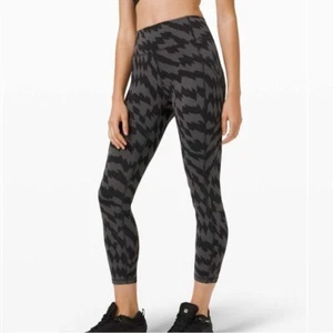 NUEVO CON ETIQUETAS Lululemon Invigorate High-Rise Tight 25" Voltaje Grafito Gris Negro talla 4 - Imagen 1 de 12
