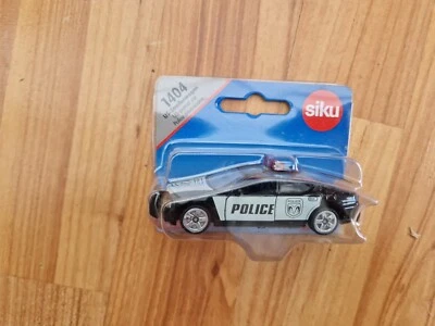 SIKU Dodge Caricabatterie US Patrol Auto Modello Riferimento 1404 Nuovo Cardato - Immagine 1 di 3