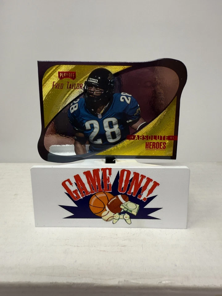 1999 Playoff Football Fred Taylor Absolute Heroes Die-Cut Gold Foil Card #HE12 - Image 1 of 2