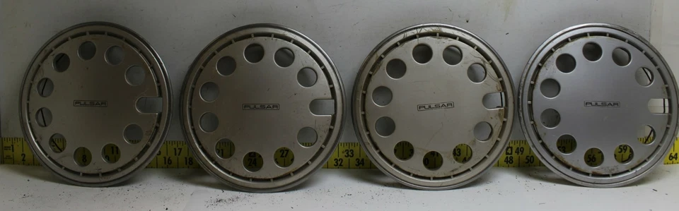 Used OEM Nissan Set of 4 13" Hub Caps 4031533M00 1985-1986 Pulsar (3414) - Image 1 of 4