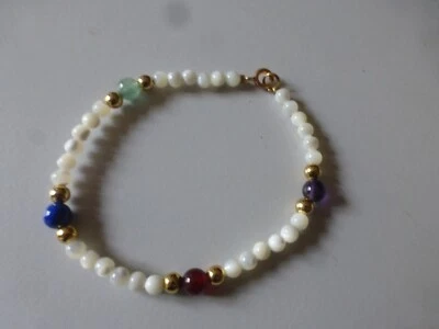 fond de stock bracelet  perle en nacre+ perle laiton + pierre long 18 cm - Photo 1/3