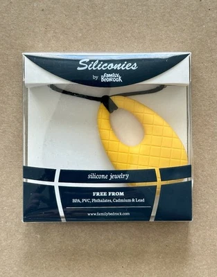 Collar Siliconies by Family Bedrock Silicona Colgante Dentición Amarillo Azafrán Foto 1 de 3