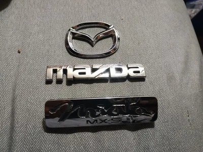 1990-1997 Mazda MX-5 Miata Rear Chrome Emblem w/ BLACK Lettering USED 90-97 - Image 1 of 4