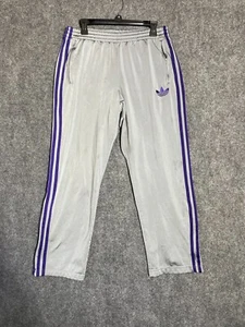 Pantalones de chándal Adidas gris púrpura para hombre medianos tres rayas bolsillos elásticos en la cintura - Imagen 1 de 16