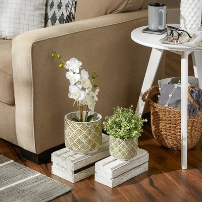 JUEGO DE MACETAS ABSTRACTAS DE CEMENTO DORADO Y BLANCO/2 Foto 1 de 4