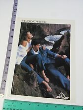 Vintage Magazine Clipping- man woman denim feet Jordache Jeans Print Ad 80's