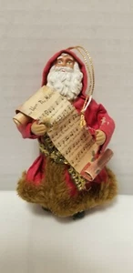 PAPER STYLE SANTA ORNAMENT WITH SHEET MUSIC 4.5" - Picture 1 of 2