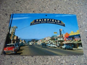 1950s BANNER SIGN over TEXAS STREET SCENE, DOWNTOWN FAIRFIELD, CA. VTG POSTCARD - Picture 1 of 1