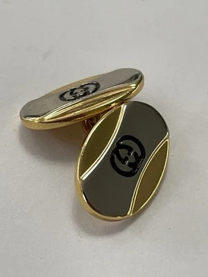 Логотип Gucci золотистый серебристый металлический GG сделано в Италии овальная форма одиночная запонка - Изображение 1 из 4