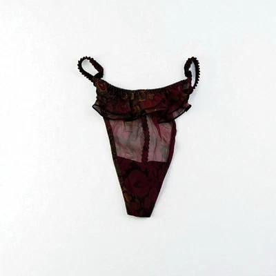 Bikini transparente vintage etiqueta dorada Victoria's Secret espalda en T tanga con volantes Foto 1 de 3