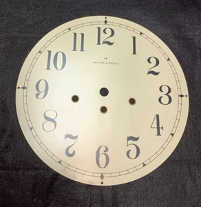 PIEZAS DE RELOJ ANTIGUO HAMILTON ESFERA DE RELOJ DE PARED 11 1/8"D CON ORIFICIOS DE CUERDA - Imagen 1 de 5