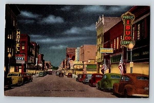 Postal de lino Ottumwa Iowa IA Main Street Theater Café Cars vista nocturna 1946 - Imagen 1 de 2
