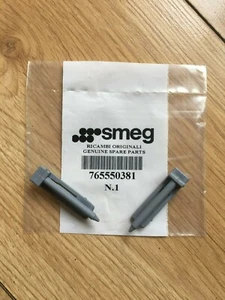 ORIGINALE SMEG LAVASTOVIGLIE CESTELLO POSTERIORE RUNNER RAIL TAPPO PERNO (CONFEZIONE DA 2)  - Foto 1 di 4