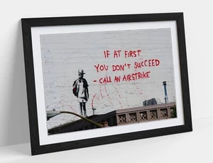 BANKSY GRAFFITI CALL AN AIRSTRIKE HEIMDEKOR GERAHMTER KUNST POSTER DRUCK 4 GRÖSSEN - Bild 1 von 10