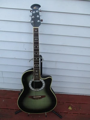 KARMAN, CELEBIRTY OVATION ELECTRIC ACOUSTIC GUITAR MODEL CC57 W/STAND. NEEDS TLC - Image 1 of 4
