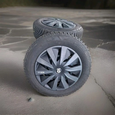 4 Winterreifen mit Felgen und Radkappen - Bild 1 von 4