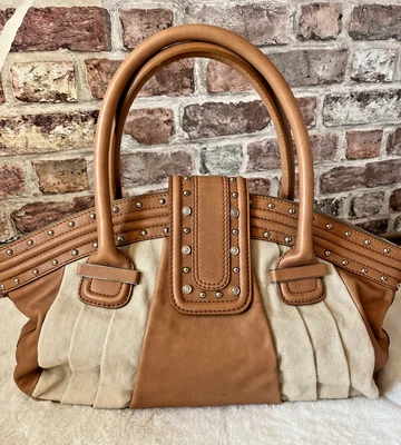 "Bolso de viaje Galliano de cuero y lona con forro de periódico exclusivo 19""x 17""" Foto 1 de 4