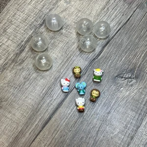 Lot of 6 Sanrio Hello Kitty Squinkies with Capsules - Picture 1 of 4