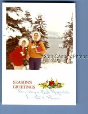 FOUND COLOR PHOTO K+9769 GIRLS IN MOUNTAINS SMILING,SEASONS GREETINGS
