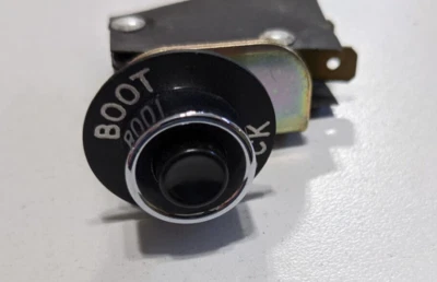 INTERRUPTOR BOTÓN LIBERACIÓN TRONCO SOMBRA PLATA ROLLS ROYCE 65 A 80 UD17337 Foto 1 de 2