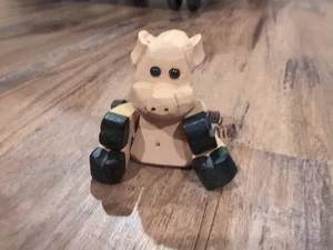 Pequeño cerdo vintage - cuidador de estante articulado de madera y alambre - Imagen 1 de 3