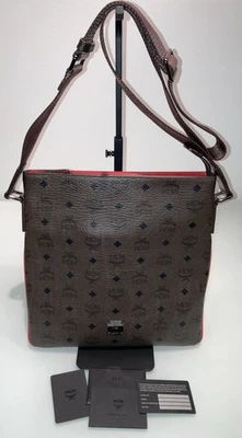 AUTÉNTICO RARO LOGOTIPO DE VISETOS MCM MARRÓN/CHOCOLATE CON RIBETE DE CUERO ROJO LIMITADO ¡EXCELENTE! Foto 1 de 4