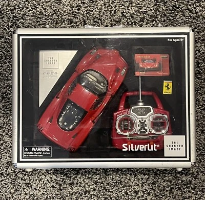 New Silverlit R/C Real Drive 1/16 Enzo Ferrari With Briefcase Sharper Image IN - Image 1 of 4
