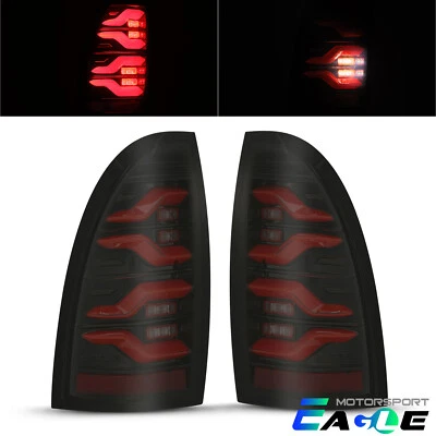 Luces traseras LED de señal negras-rojas Fit 05-15 Toyota Tacoma serie LUXX Foto 1 de 4