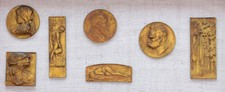 FRAMED COLLECTION OF ANTIQUE BRONZE ART MEDALS  including STANISLAV SUCHARDA