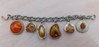 Dangle charm bracelet gold tone with amber coloured stones #9012