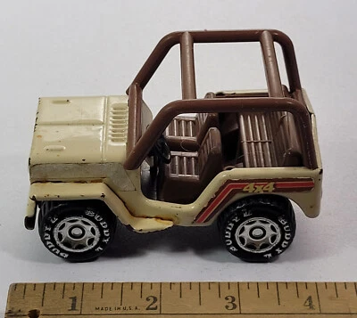 Jeep Buddy L 4x4 marrón tostado acero prensado raro de colección Foto 1 de 4