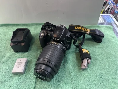 Cámara Nikon D3100 DSLR con lente VR de 55-200 mm + cargador Foto 1 de 4