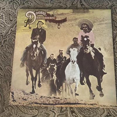 Vintage 1975  NEAR MINT Doobie Brothers - Stampede  LP Vinyl : BS-2835 - Image 1 of 4