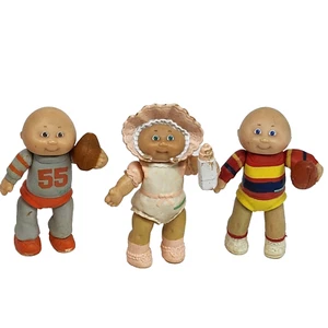 3 VINTAGE 1984 CABBAGE PATCH KIDS PVC FIGURES BOYS W FOOTBALLS BABY W BOTTLE - Picture 1 of 9
