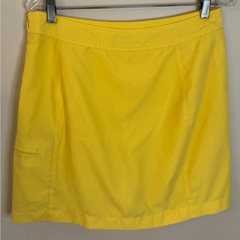 Skort Izod Amarillo Vibrante con Cremallera Lateral y Bolsillo para Monedas Cremallera Lateral Talla 10 Foto 1 de 4