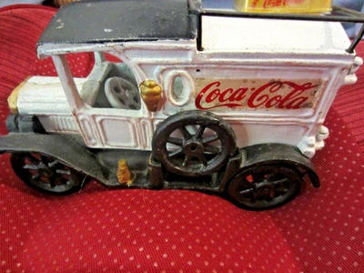 PRE-OWNED CAST IRON COCA COLA TRUCK WITH UMBRELLA & 12-CUTE COCA COLA BOTTLES - Image 1 of 4