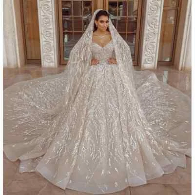 Luxury Glitter Cathedral Wedding Dresses 2025 V-Neck Long Sleeves Sparkly Sequin - Image 1 of 4