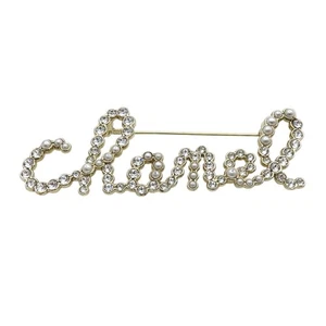 CHANEL Pearl & Crystal Script Logo Brooch Pin Gold Plated - Picture 1 of 5