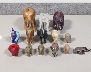 Konvolut 13 Elefanten Skulpturen aus Holz, Metall, Stein - Bild 1 von 13