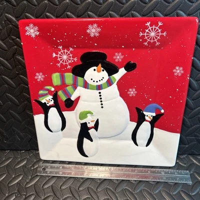 St Nicholas Square Jolly Snowman Square 11” Platter Penguin Snowflakes Red/wht. - Image 1 of 4